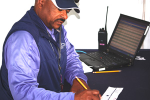 Keith_Fig_Newton_at_work_inside_the_scoring_tent_5294a