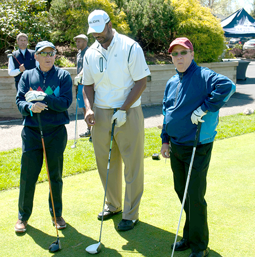 Chris Canty with members of his foursome at the Champions Golf Classic_Heard and Scene_500