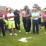 Champions Tour Pro golfer Jim Thorpe humors participants while teaching the golf clinic